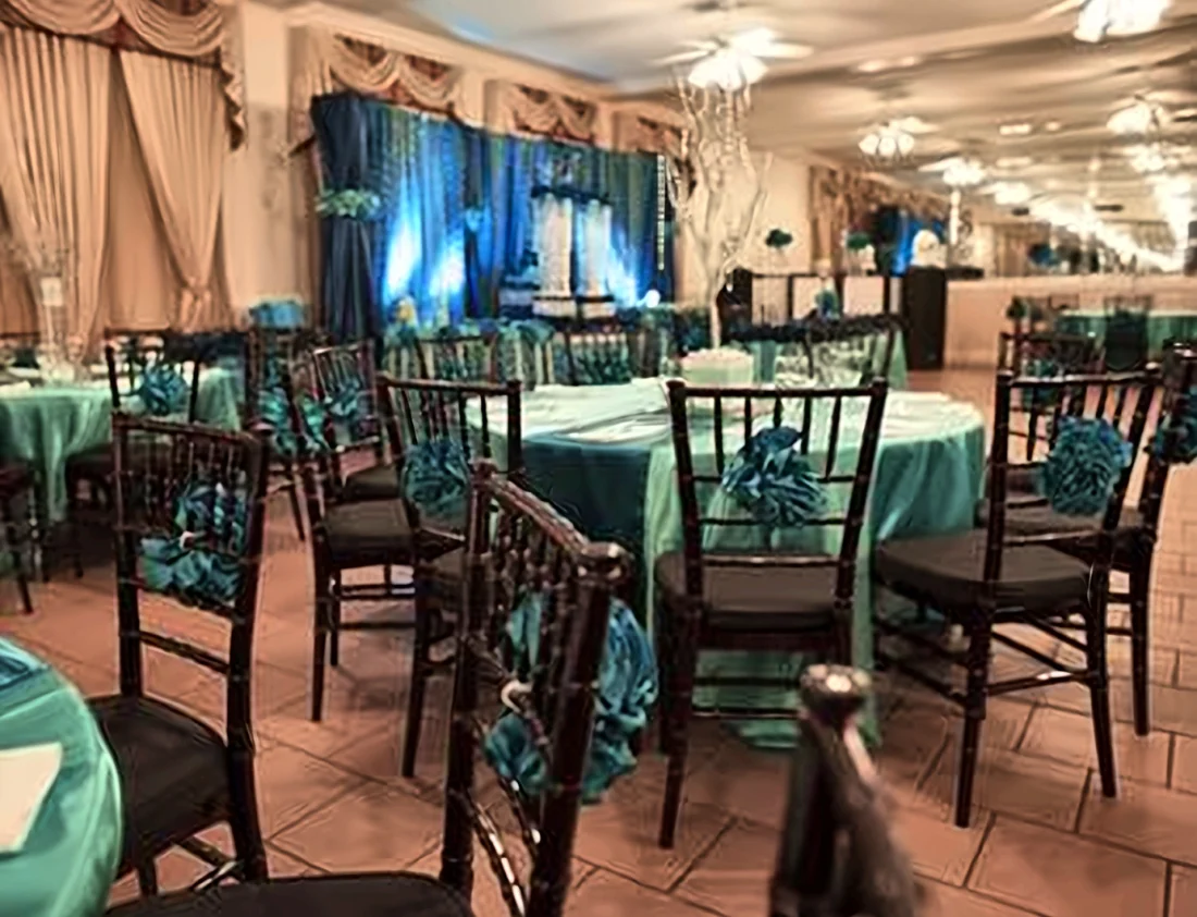 Del Sol Banquet Hall set with teal linens