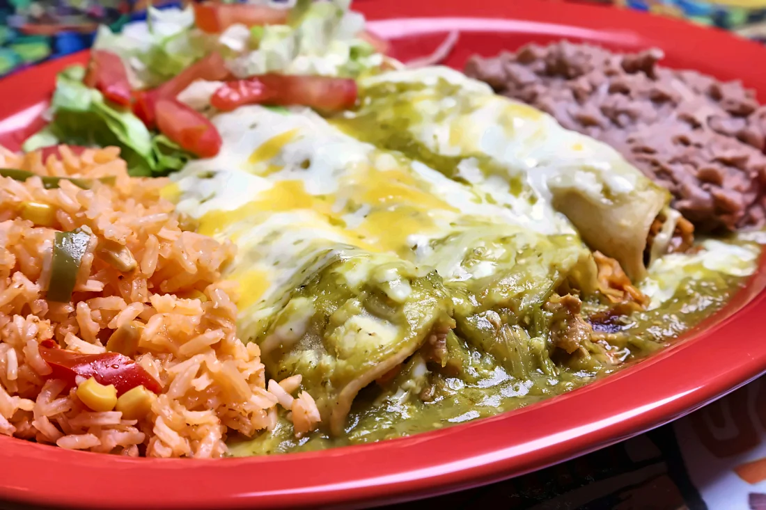 Green enchiladas with rice and beans